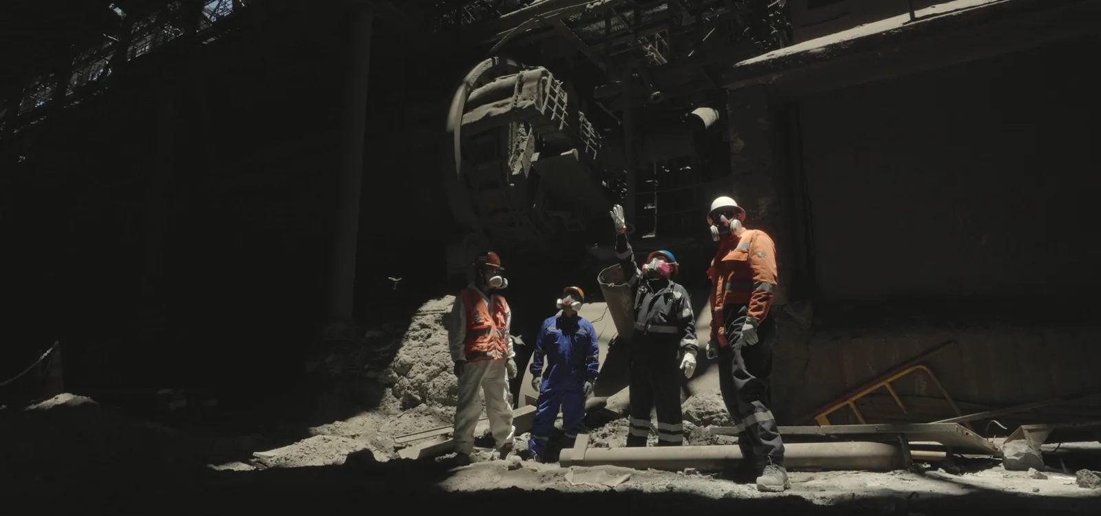 LTF workers under the smelter structure